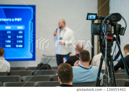 Business presentation event filmed with professional equipment for professional recording Business presentation event filmed with professional equipment for professional recording 130055481
