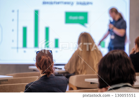 Business presentation with charts in modern conference room environment Business presentation with charts in modern conference room environment 130055551