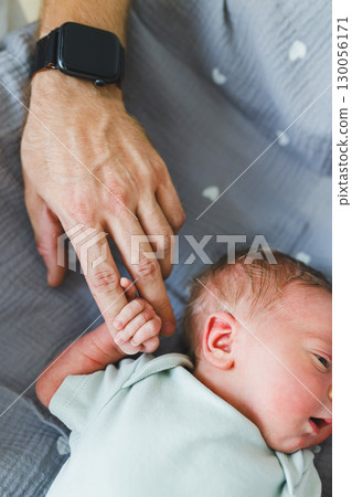 Tender Moments A Parents Loving Touch with Their Precious Newborn Baby, Capturing the Heartwarming Bond Between Parents and Their Infant Through Affectionate Gestures and Caring Support Tender Moments A Parents Loving Touch with Their Precious Newborn Baby, Capturing the Heartwarming Bond Between Parents and Their Infant Through Affectionate Gestures and Caring Support 130056171