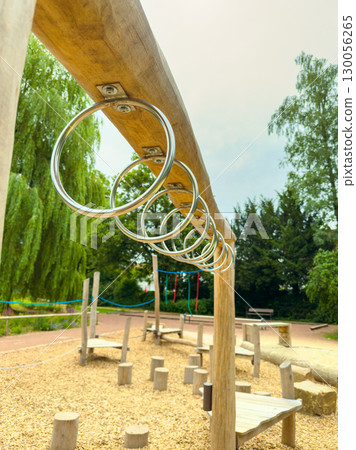 Explore our highquality Metal Gymnastic Rings with a sturdy Wooden Structure, ideal for Outdoor Play Areas. Enjoy endless fun and great opportunities for exercise and skill development Explore our highquality Metal Gymnastic Rings with a sturdy Wooden Structure, ideal for Outdoor Play Areas. Enjoy endless fun and great opportunities for exercise and skill development 130056265