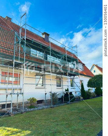 Setting Up Scaffolding for Home Renovation A Comprehensive Guide to Enhancing the Exterior Appearance and Structure of a Residential Building to Ensure Safety During Renovation Projects 130056401