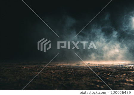 Abstract texture of the ground surface with rocks and thick fog swirling against a night background. 130056489