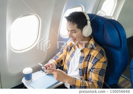 Happy man airplane travel, Portrait of man with journey. 130056698