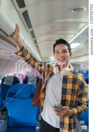 Happy man airplane travel, Portrait of man with journey. Happy man airplane travel, Portrait of man with journey. 130056700