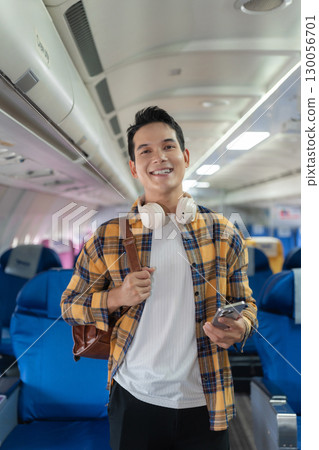 Happy man airplane travel, Portrait of man with journey. 130056701