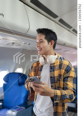 Happy man airplane travel, Portrait of man with journey. Happy man airplane travel, Portrait of man with journey. 130056702