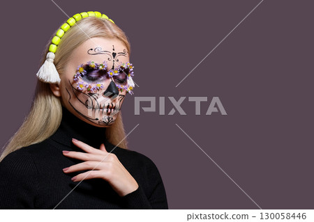 Beautiful Halloween Make-Up Style. Blond Model Wear Sugar Skull Makeup with Red Roses. Santa Muerte concept Beautiful Halloween Make-Up Style. Blond Model Wear Sugar Skull Makeup with Red Roses. Santa Muerte concept 130058446