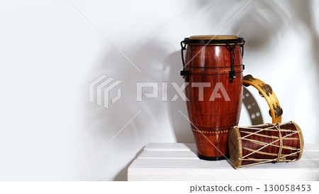Composition of musical ethnic instrument. Maracas, tambourine, conga and ethnic drum. Percussion rhytm instruments 130058453