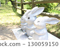 A stone rabbit statue standing in the grounds of Izumo Taisha Shrine in Shimane 130059150