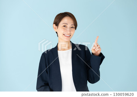 Female business portrait pointing 130059620