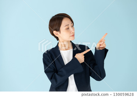Female business portrait pointing 130059628