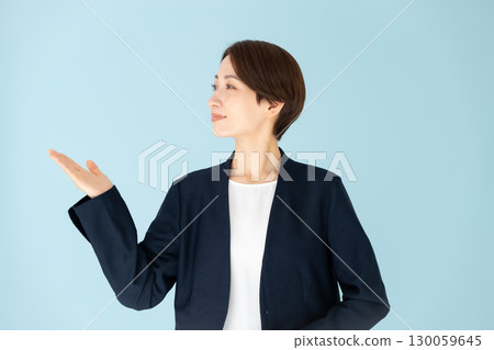 Female business portrait hand waving 130059645