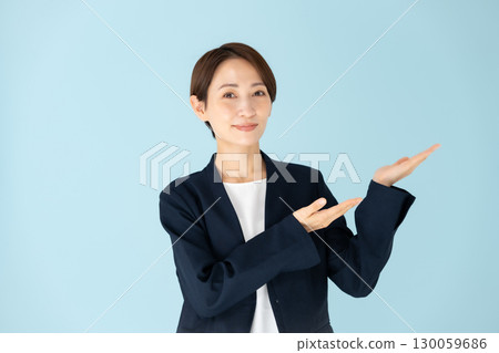 Female business portrait hand waving Female business portrait hand waving 130059686