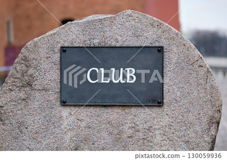 Club Concept. Copy space. Word club written on the plaque of a large stone monument. Club Concept. Copy space. Word club written on the plaque of a large stone monument. 130059936
