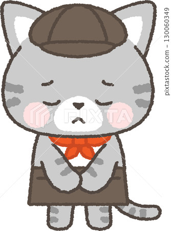 A tabby cat cafe employee bows in apology 130060349