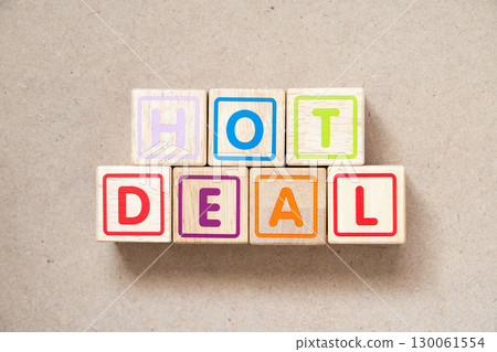 Alphabet letter block in word hot deal on wood background Alphabet letter block in word hot deal on wood background 130061554