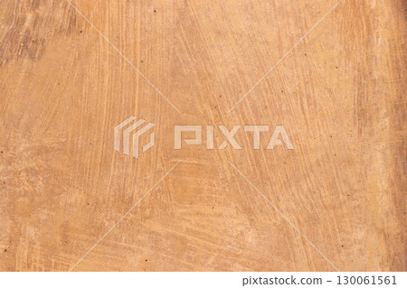 Orange color of grunge concrete textured background with copy space for decoration or use as layer 130061561