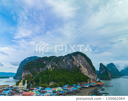 An aerial view of the Panyee Islands, with many islands and intact mangrove forests. An aerial view of the Panyee Islands, with many islands and intact mangrove forests. 130062064