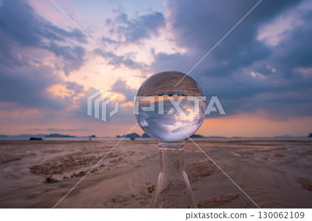 cloud moving in beautiful sunset inside crystal ball. cloud moving in beautiful sunset inside crystal ball. 130062109