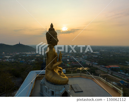 aerial view scenery sky in sunrise above the golden big buddha. 130062112