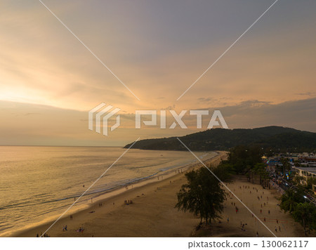aerial view reflection amazing sky of sunset at Karon beach. 130062117