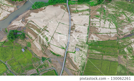 Aerial view of Su Tong Pae bamboo bridge connecting temple to village Aerial view of Su Tong Pae bamboo bridge connecting temple to village 130062261