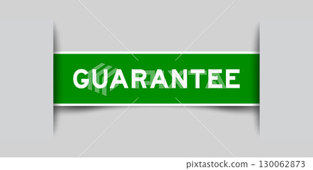 Green color square shape sticker label with word guarantee inserted in gray background 130062873
