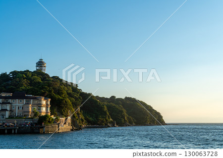 Beautiful sunset over the sea and cityscape 130063728
