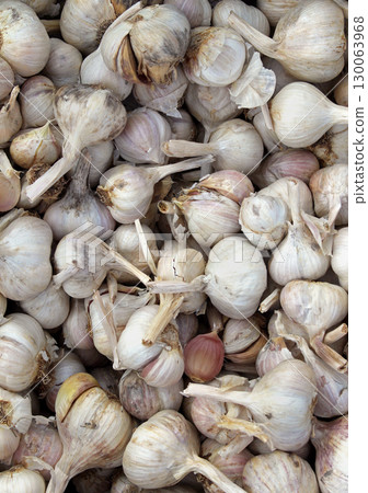 Raw garlic pile 130063968