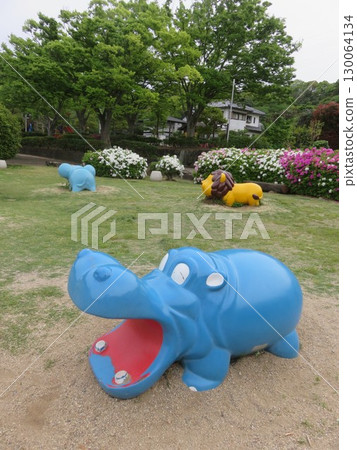 Animal play equipment in the park 130064134