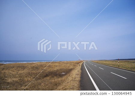 Sarobetsu, Hokkaido in early spring. The Ororon Line on the Sea of Japan shrouded in spring mist. 130064945