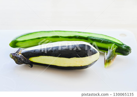 Peeled water eggplant and cucumber Peeled water eggplant and cucumber 130065135