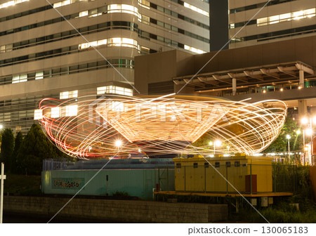 Amusement park attractions at night Amusement park attractions at night 130065183