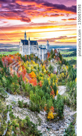 Astonishing autumn view of famous Neuschwanstein Castle at sunset. 130065398