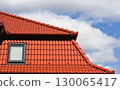 Roof of a house with window 130065417