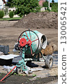 Cement mixer machinery at the construction site 130065421