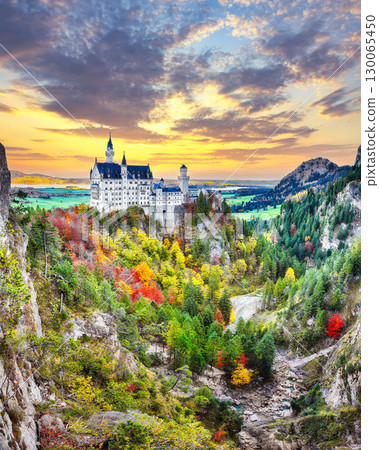 Amazing autumn view of famous Neuschwanstein Castle at sunset. 130065450