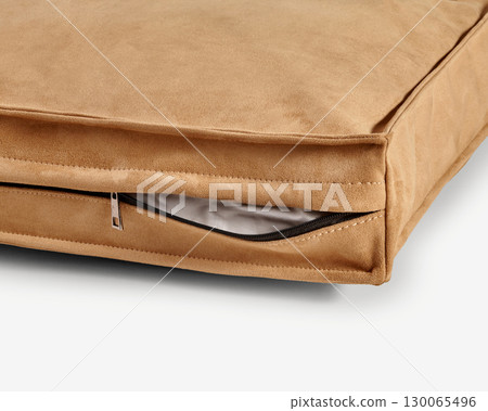 Close-up of zipper on washable suede pet bed cover showing removable cushion Close-up of zipper on washable suede pet bed cover showing removable cushion 130065496