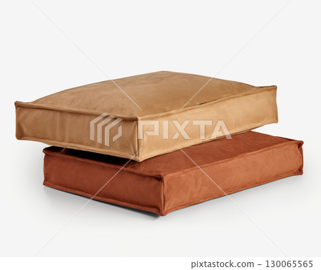 Two comfortable pet beds resting on white background Two comfortable pet beds resting on white background 130065565