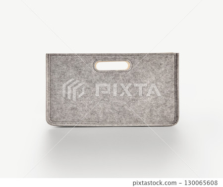 Gray felt storage box with handle on white background Gray felt storage box with handle on white background 130065608