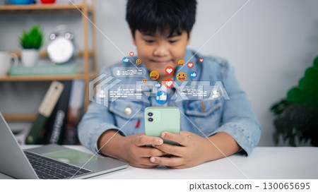 Asian boy using smartphone with social media icons and online communication concept 130065695