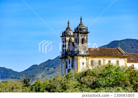 Church tower amidst the vegetation Church tower amidst the vegetation 130065805