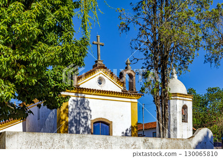Old church with stone crucifix 130065810