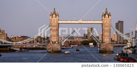 Tower Bridge standing majestically over River Thames in London 130065823