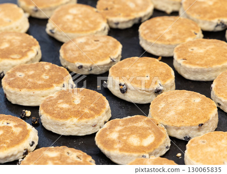 Traditional Welsh Cakes Cooking on a Hot Griddle in Cardiff Traditional Welsh Cakes Cooking on a Hot Griddle in Cardiff 130065835