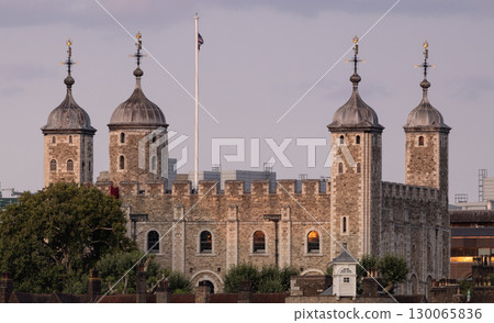 Tower of London with lowered flag at sunset, London, United Kingdom Tower of London with lowered flag at sunset, London, United Kingdom 130065836