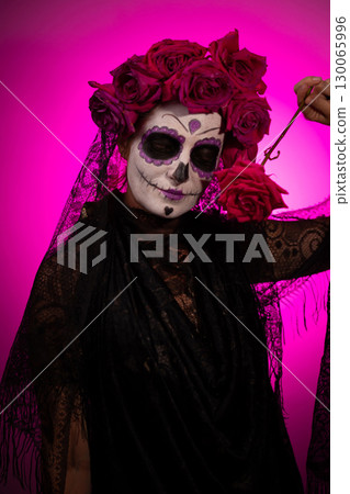 Girl With Sugar Skull Makeup and Roses for Day of the Dead Girl With Sugar Skull Makeup and Roses for Day of the Dead 130065996