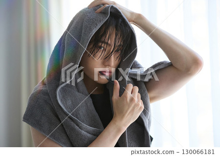 Young Asian man portrait after bathing Young Asian man portrait after bathing 130066181