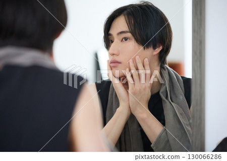 Portrait of a young Asian man about beauty Portrait of a young Asian man about beauty 130066286