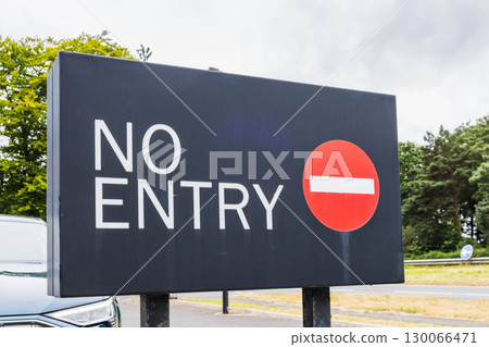 No Entry Road Sign with Red Prohibition Symbol on Street, Traffic Restriction No Entry Road Sign with Red Prohibition Symbol on Street, Traffic Restriction 130066471